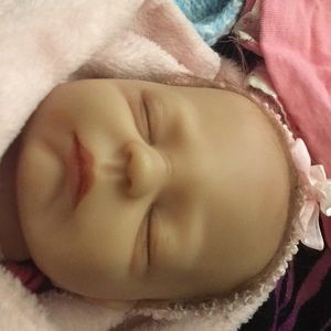 Realistic baby doll